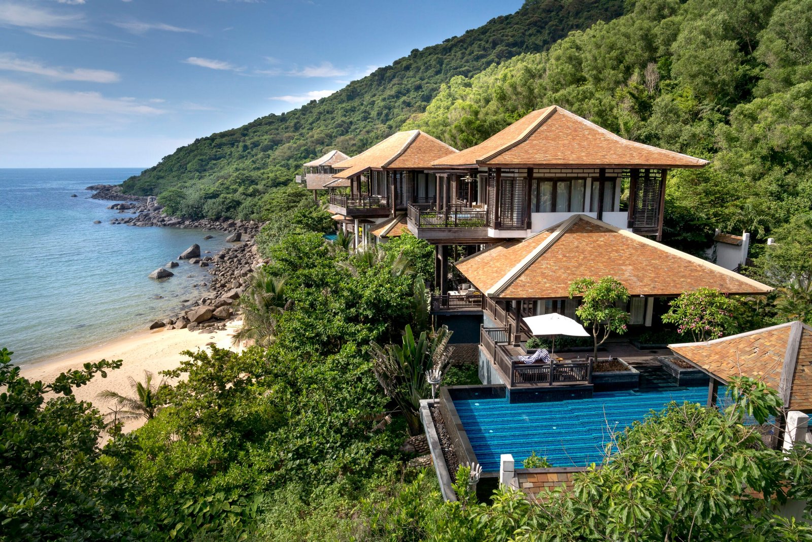 Explore this stunning tropical villa with a private pool and beach access.